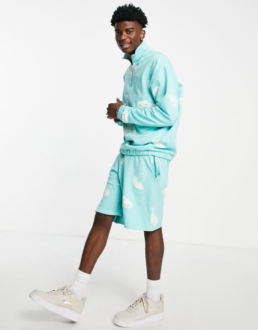 ASOS DESIGN coord oversized jersey shorts in blue with all over