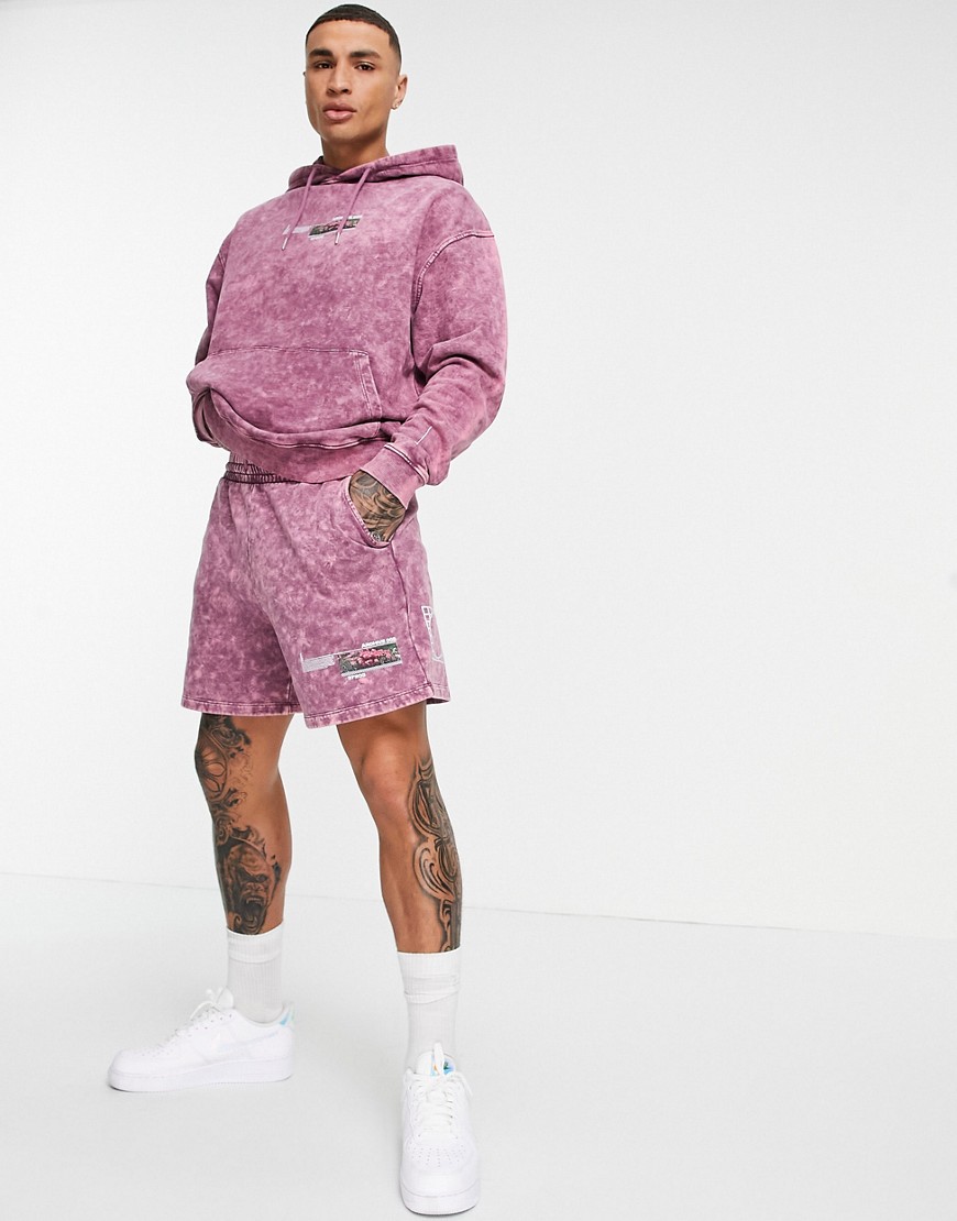 ASOS DESIGN co-ord oversized jersey shorts in deep purple acid wash with leg print