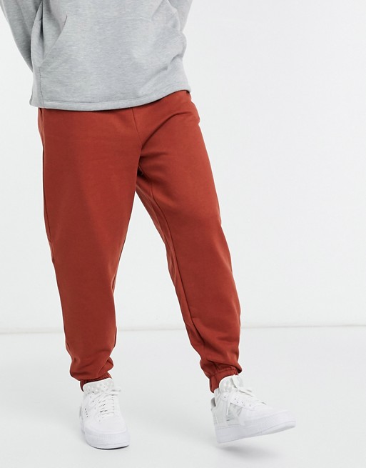 ASOS DESIGN organic co-ord oversized joggers in brown red