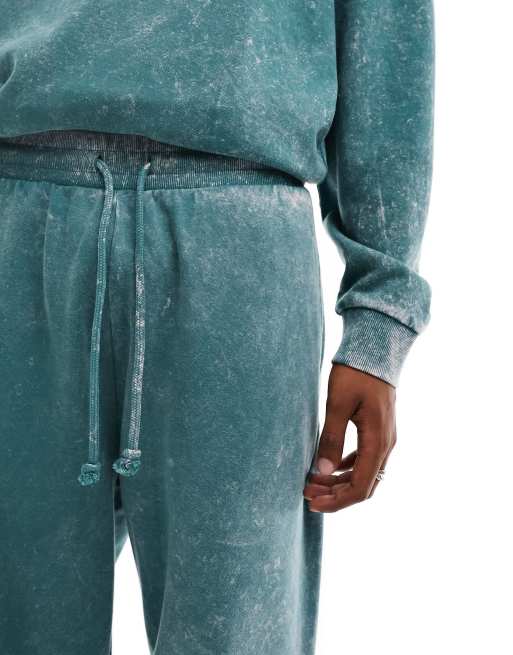 ASOS DESIGN co ord oversized joggers in dark green acid wash with side text print embroidery