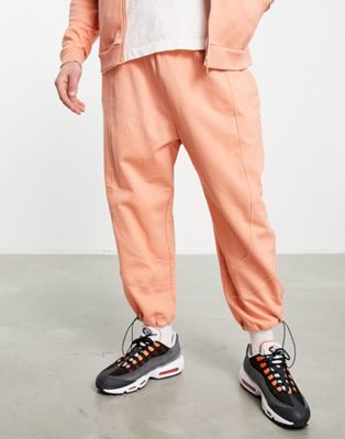 ASOS DESIGN co-ord oversized joggers with panel detail in pastel orange - ASOS Price Checker