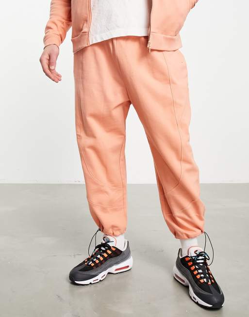 Orange discount joggers outfit