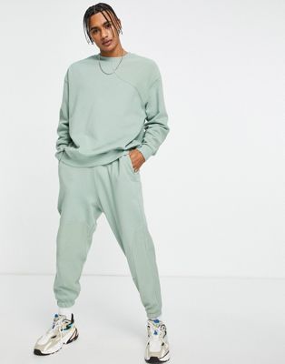 ASOS DESIGN co-ord oversized joggers with wavey rib panels in washed green