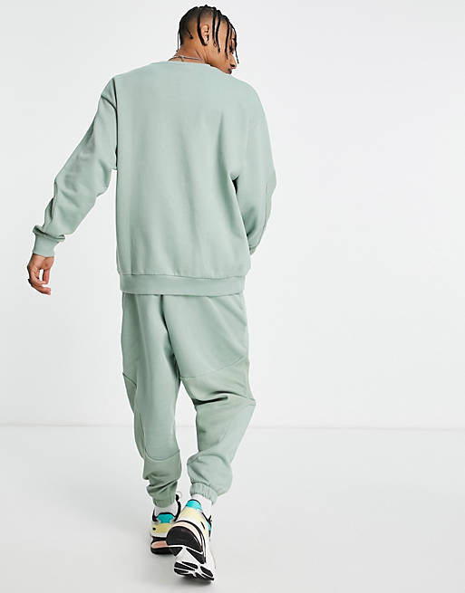 Tracksuits co-ord oversized joggers with wavey rib panels in washed green 
