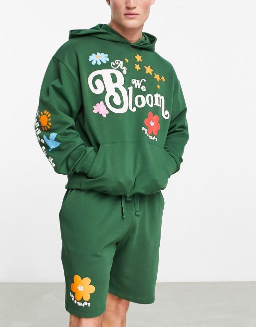 ASOS DESIGN co-ord oversized shorts in dark green with skate multiplacement puff print