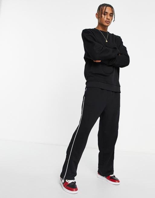 ASOS DESIGN Tall straight leg joggers with side poppers in black