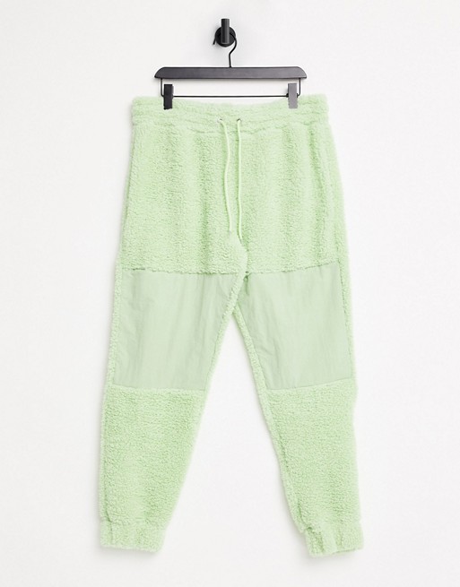 ASOS DESIGN co-ord oversized teddy borg joggers in mint green with nylon panels