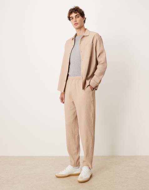 ASOS DESIGN co-ord plisse tapered trousers in beige