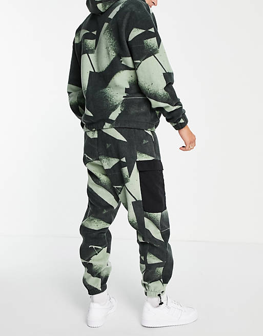 Tracksuits co-ord polar fleece oversized joggers in all camo over print 