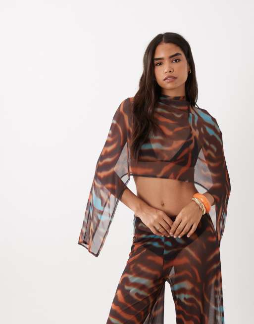 ASOS DESIGN co-ord printed mesh trouser & cape in brown animal print, 2 of 3