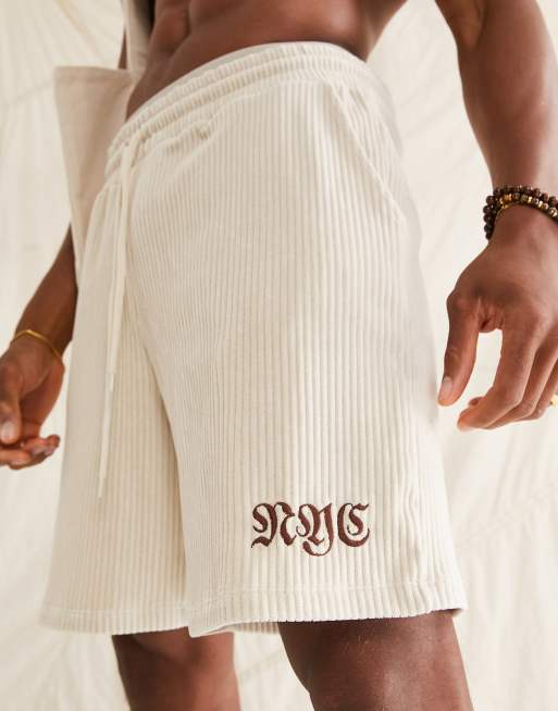 ASOS DESIGN co-ord relaxed ribbed velour short with city embroidery in beige, 3 of 4