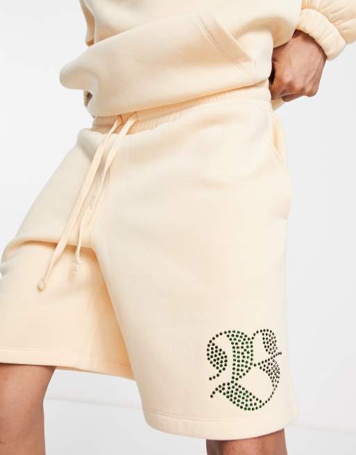 ASOS DESIGN co-ord relaxed shorts in beige with rhinestone text print, 4 of 4