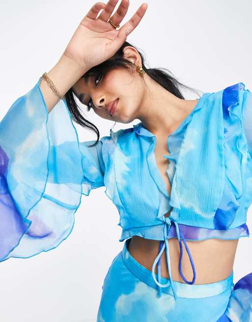 ASOS DESIGN co-ord ruffle detail top with tie front in blue abstract print 