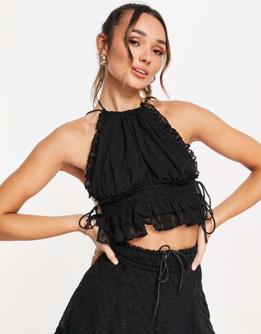 ASOS DESIGN crop top with halter neck in black