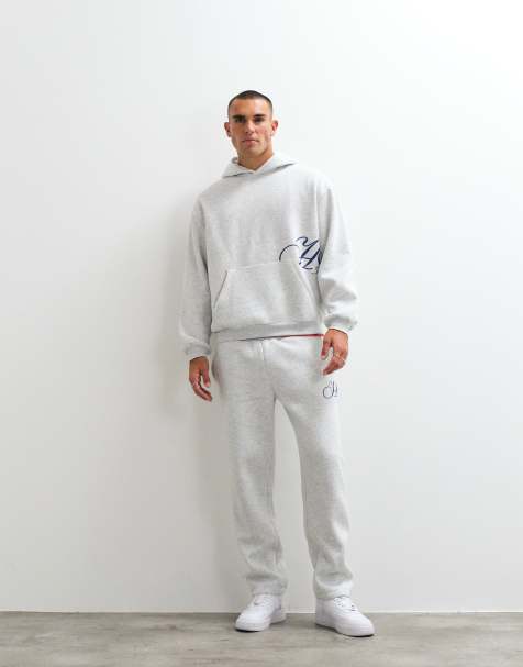 ASOS DESIGN - Co-ord set van oversized hoodie van polykatoen met pigmentprint en joggingbroek met rechte pijpen in gemêleerd grijs - view 1