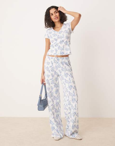 ASOS DESIGN - Co-ord set van top en broek met wafelstructuur in blauw met bloemenprint - view 1