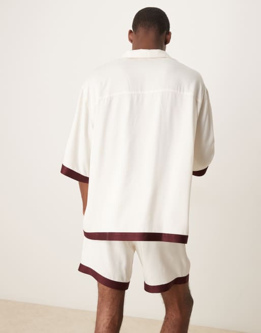 ASOS DESIGN co-ord shorts in mid length with border print in beige, 2 of 4
