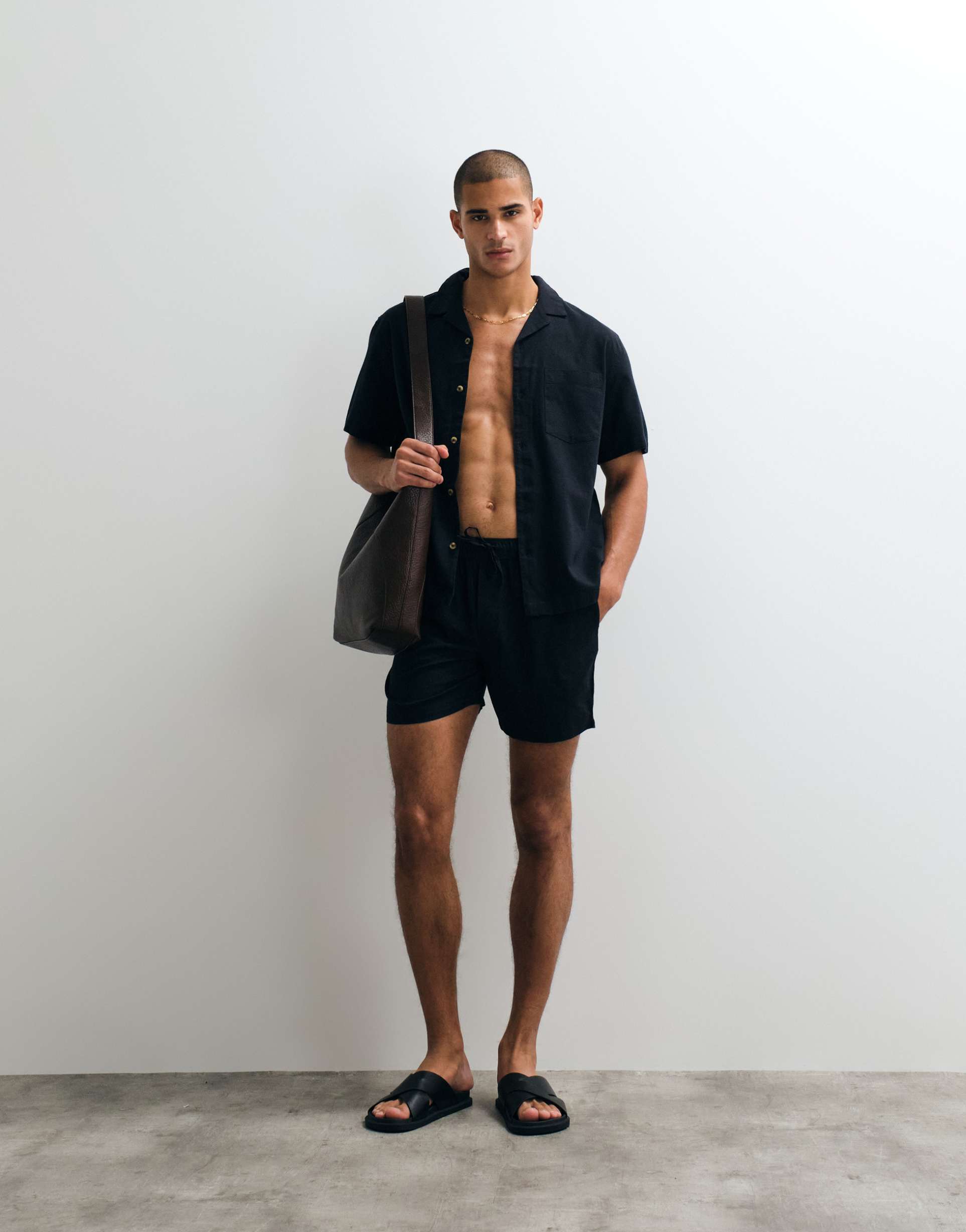 ASOS DESIGN co-ord shorts in mid length with linen in black