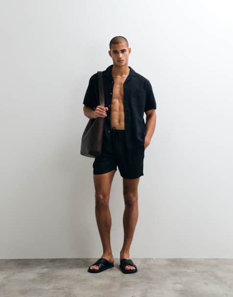 ASOS DESIGN co-ord shorts in mid length with linen in black