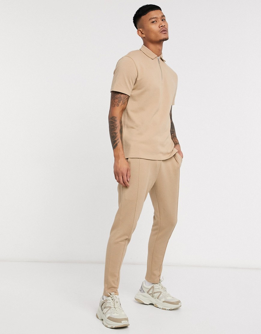 ASOS DESIGN co-ord skinny joggers in textured fabric with pintucks in beige