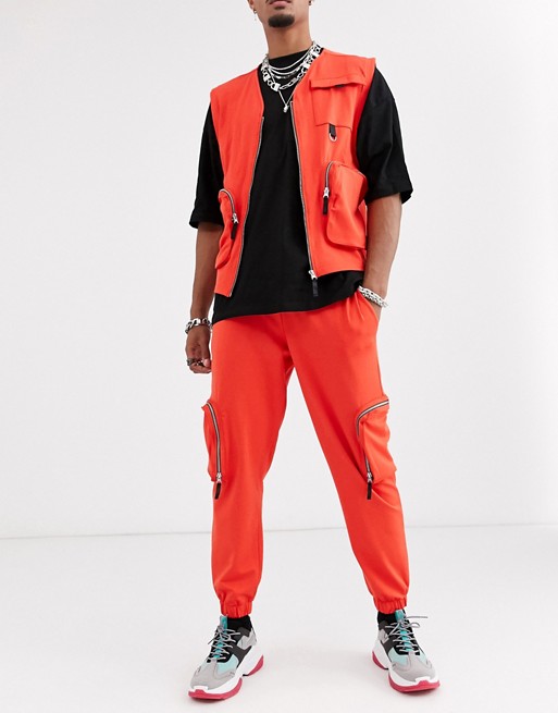 ASOS DESIGN co-ord skinny utility cargo joggers in orange poly tricot
