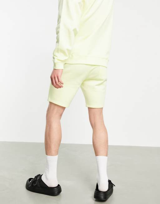 ASOS DESIGN co-ord slim jersey shorts with pin tucks in yellow, 2 of 4