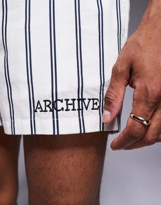 ASOS DESIGN co-ord stripe shorts in short length with embroidery in white, 3 of 5