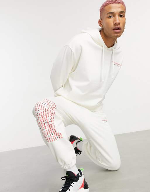 ASOS DESIGN Co ord sweatpants with Biggie Smalls print in ecru