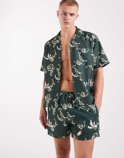 ASOS DESIGN co-ord swim shorts in linen look short length with print in green - view 1