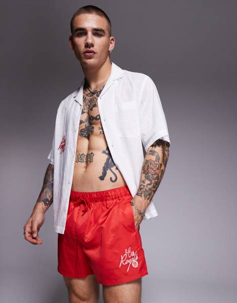 ASOS DESIGN co-ord swim shorts in short length in red with white embroidery - view 1