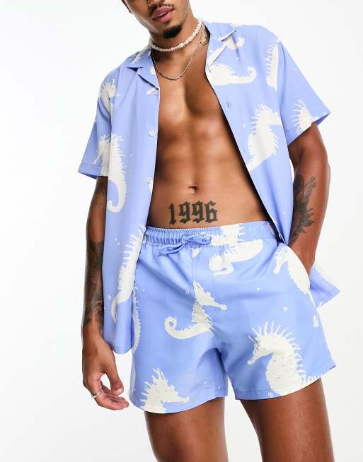 ASOS DESIGN co-ord swim shorts in short length in seahorse print