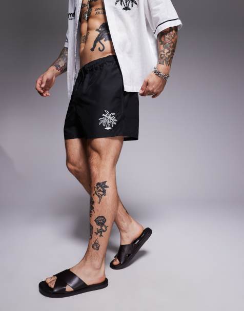 ASOS DESIGN co-ord swim shorts in short length with palm tree in embroidery in black - view 1