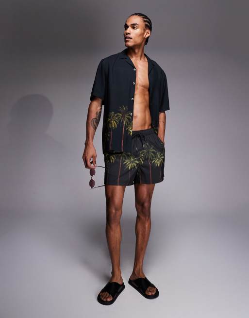 ASOS DESIGN co-ord swim shorts in short length with palm tree print in black, 2 of 5