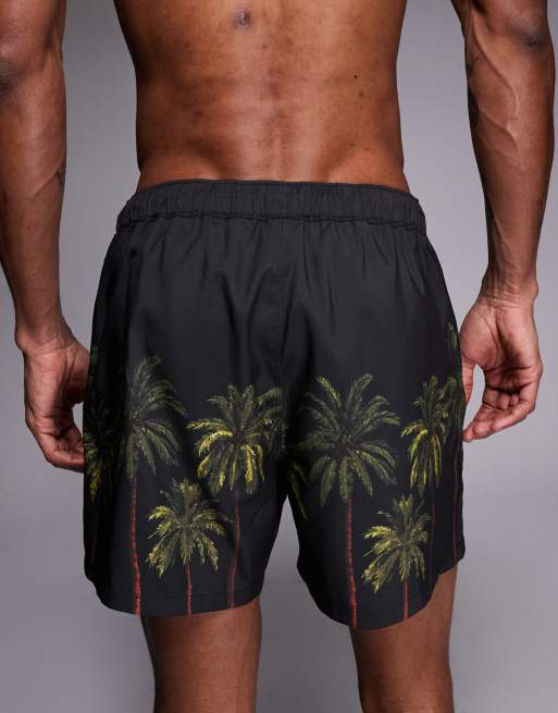 ASOS DESIGN co-ord swim shorts in short length with palm tree print in black, 5 of 5