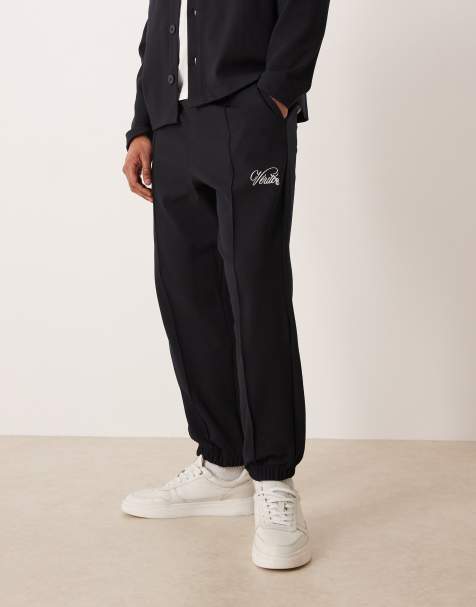ASOS DESIGN co-ord tapered  jacquard jogger with embroidery in navy