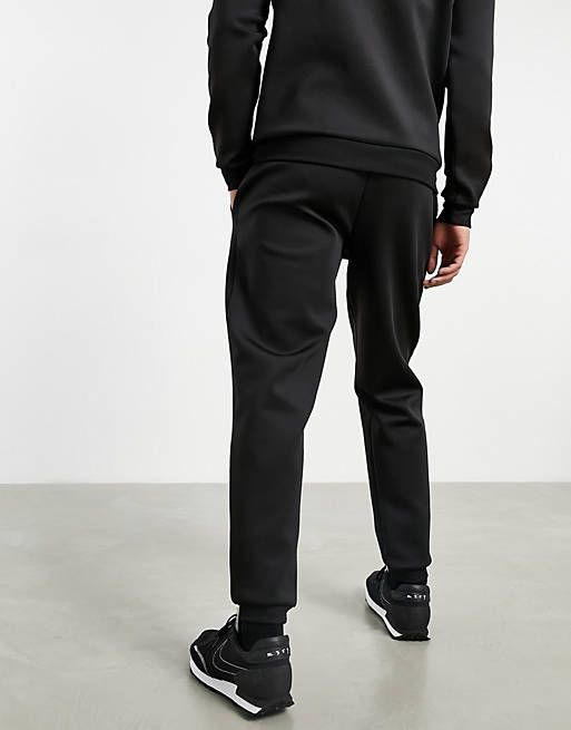 Tracksuits co-ord tapered joggers in black scuba with Roman numerals printed zips 