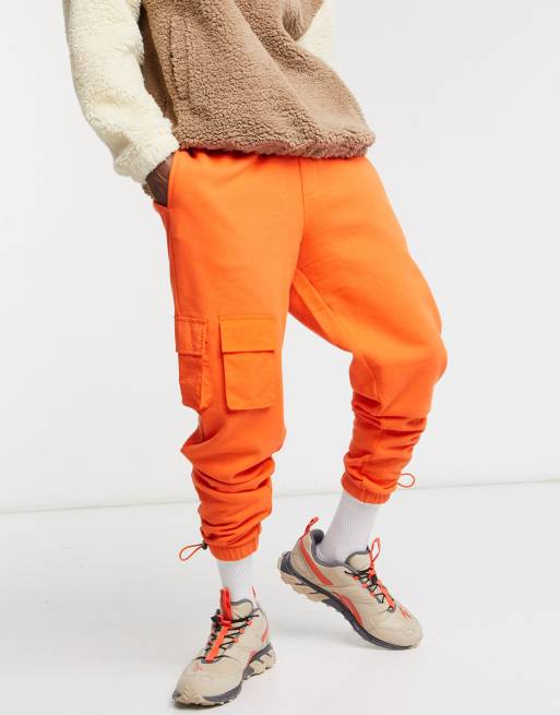 Orange best sale joggers men