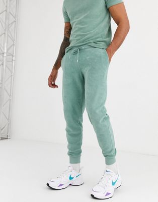ASOS DESIGN co-ord tapered joggers in washed green towelling