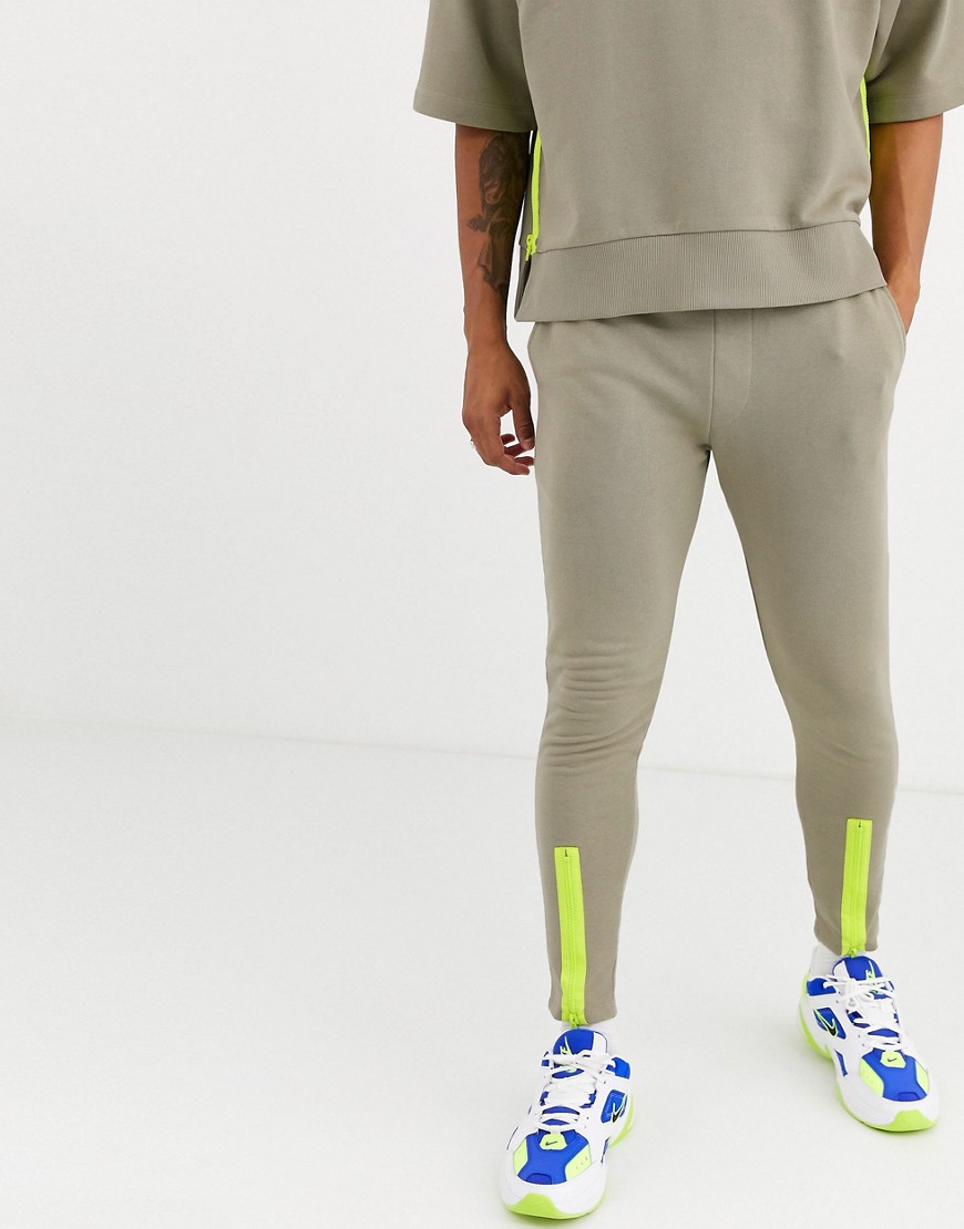 ASOS DESIGN co-ord tapered joggers with neon cuff detail-Green
