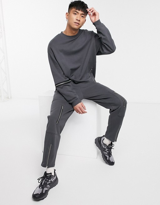 ASOS DESIGN co-ord tapered joggers with zip details in washed black