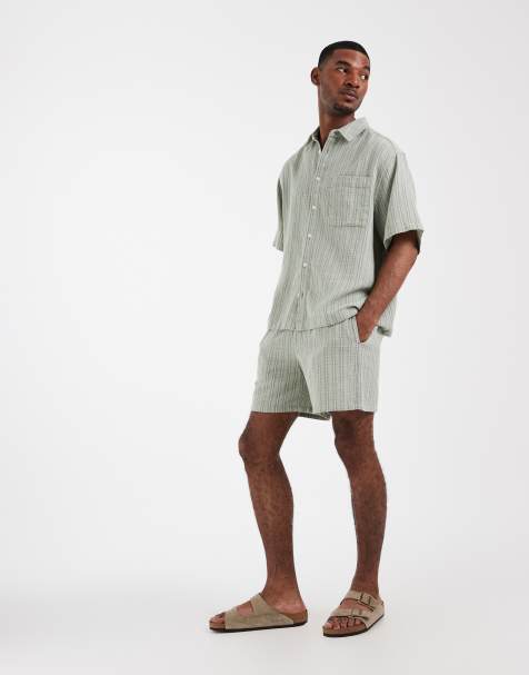 ASOS DESIGN co-ord textured mid length shorts in sage green - view 1