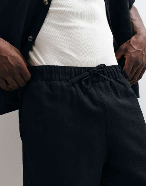 ASOS DESIGN co-ord textured shorts in mid length in black, 5 of 5