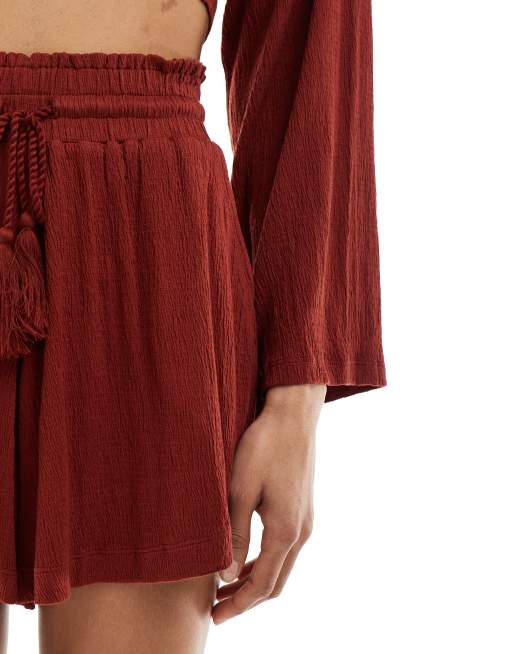 ASOS DESIGN co-ord textured tassel tie waist flippy shorts in rust, 3 of 5