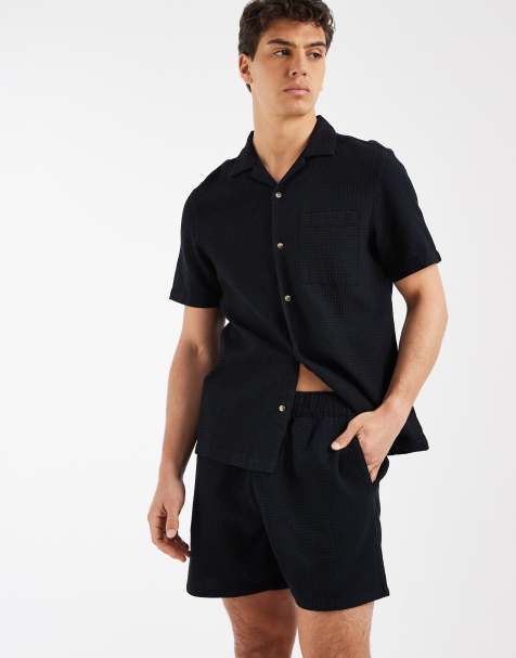 ASOS DESIGN co-ord waffle textured mid length shorts in black - view 1