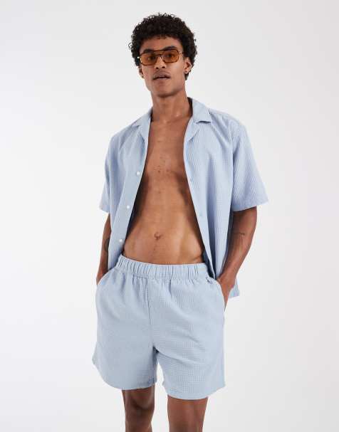 ASOS DESIGN co-ord waffle textured mid length shorts in blue - view 1