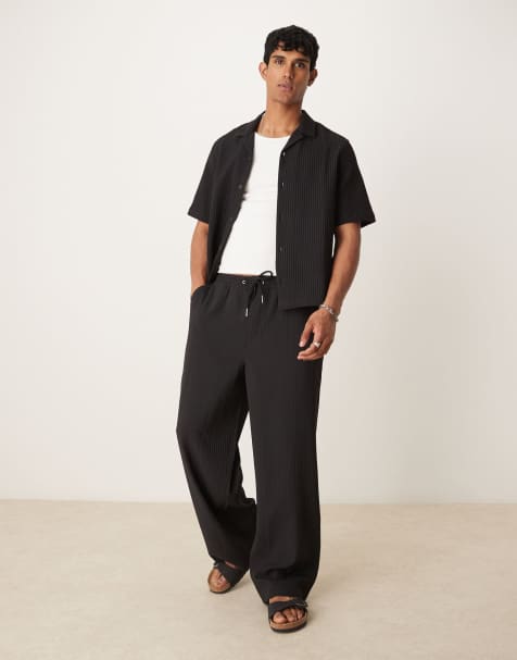 ASOS DESIGN co-ord wide leg plisse trousers in black