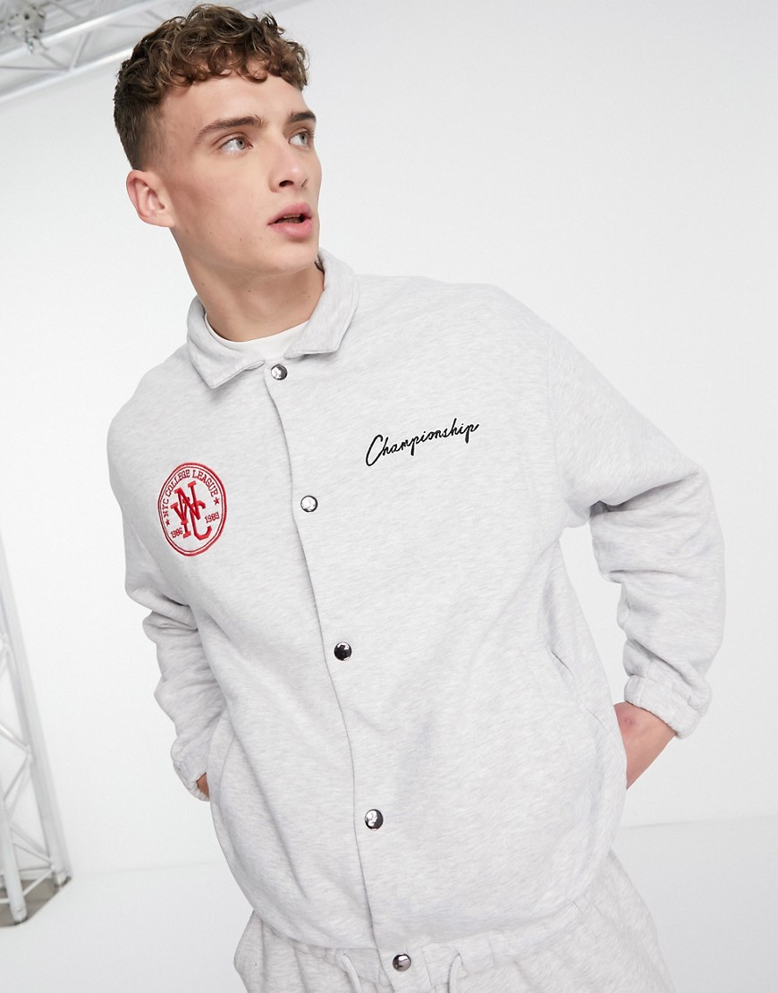 ASOS DESIGN coach jersey jacket in white heather with logo chest prints