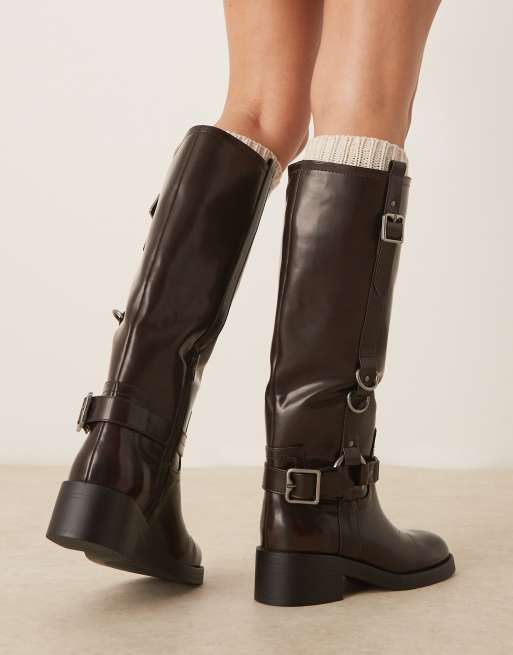 ASOS DESIGN Cobra buckle harness knee boots with silver hardware in burgundy