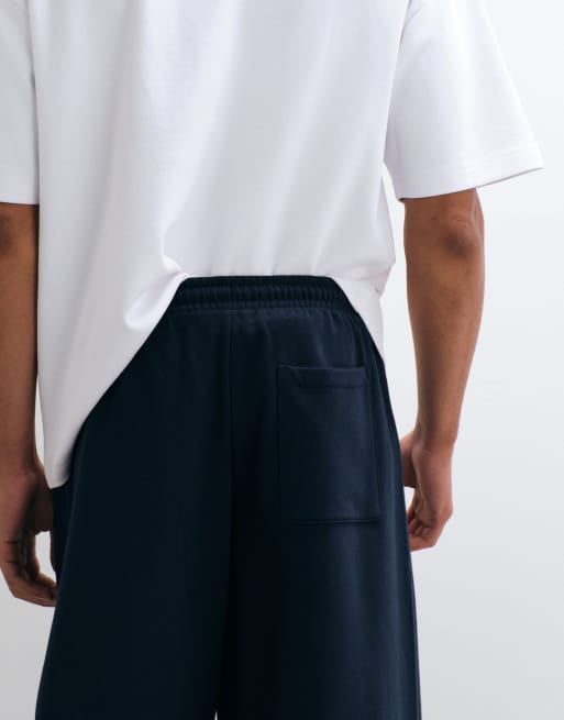 ASOS DESIGN cocoon barrel trackies in navy, 2 of 5