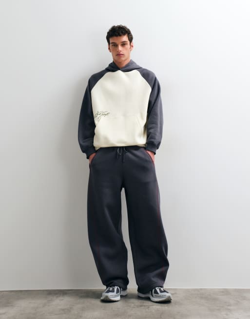 ASOS DESIGN – Set in Anthrazit aus kastigem Relaxed-Fit-Sweatshirt mit Rundhalsausschnitt und Jogginghose mit Kontrast-Ziernähten, 3 von 3